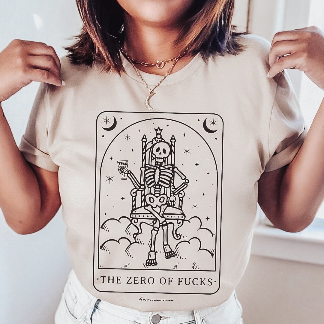 Karmavore The Zero of F*cks Premium Tee Heather Sand / S
